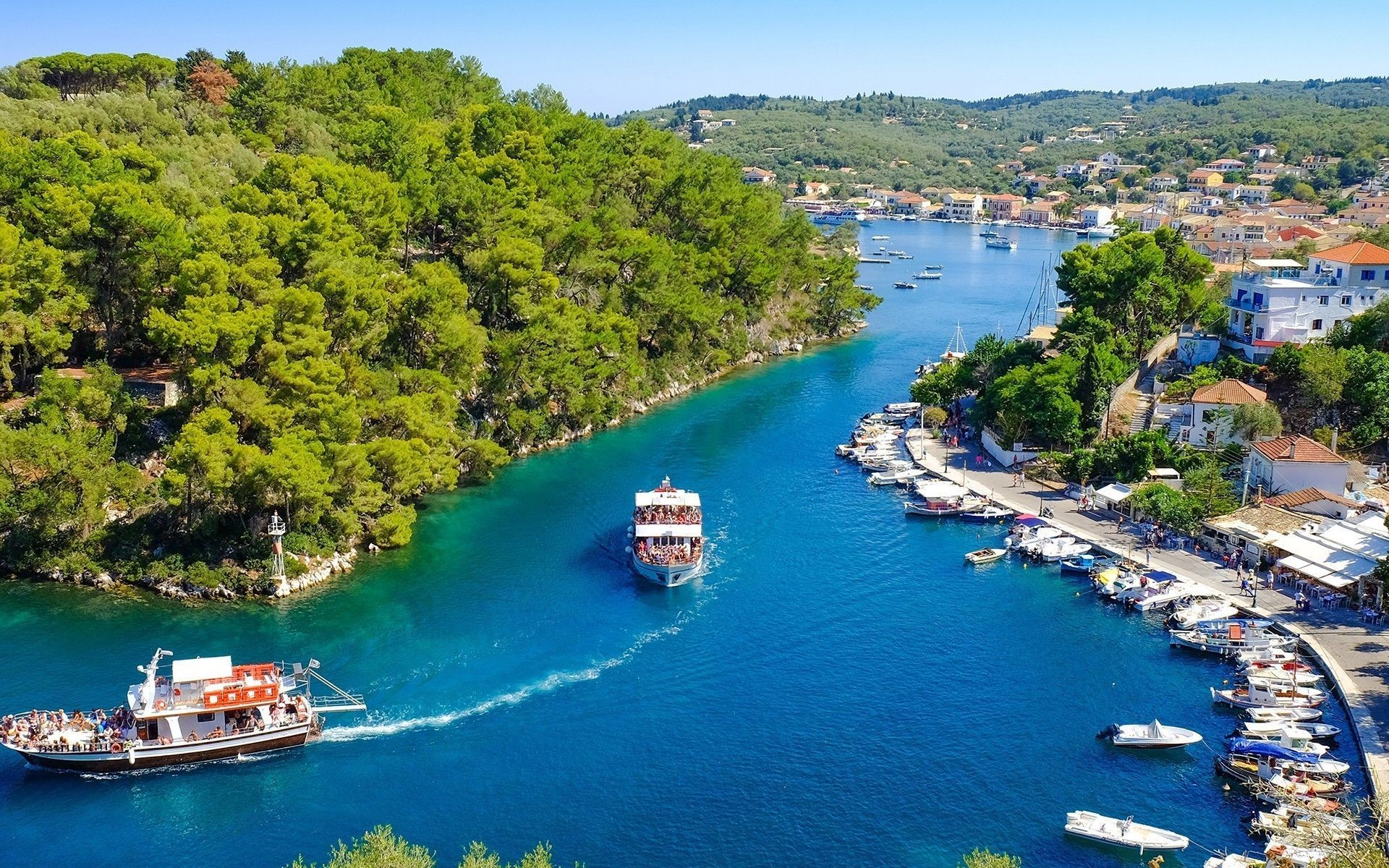 shutterstock_459792658_Paxos_island_panorama_with_boat_entering_the_grand_canal_a971e4f165.jpeg